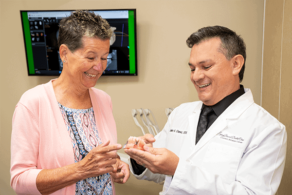 Dr. Chavez explaining cosmetic options with a patient